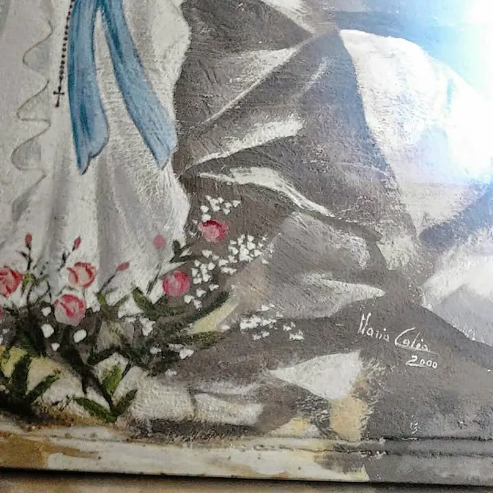 La stessa Madonna, la parte in basso con i fiori e la firma